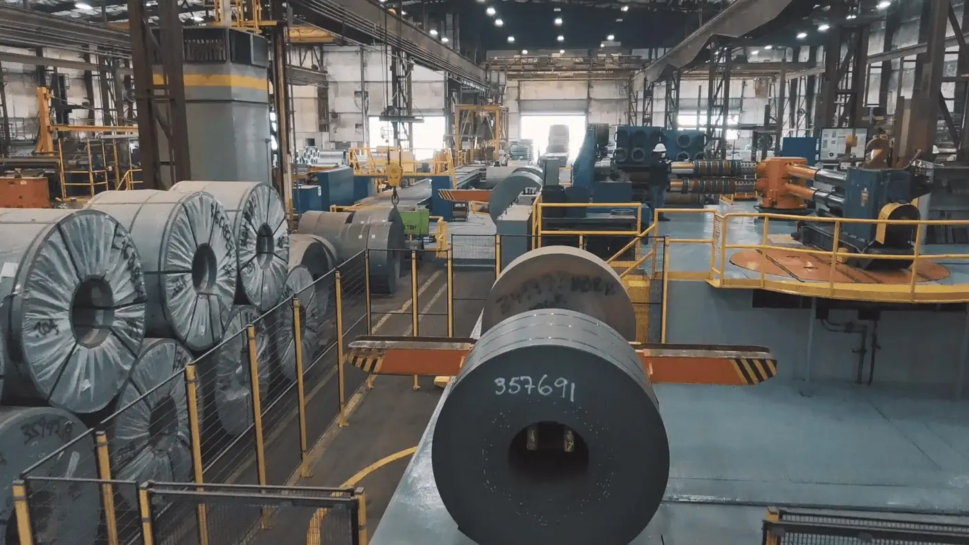 Master coils staged at the entry of a Bayou Processing & Storage slitting line
