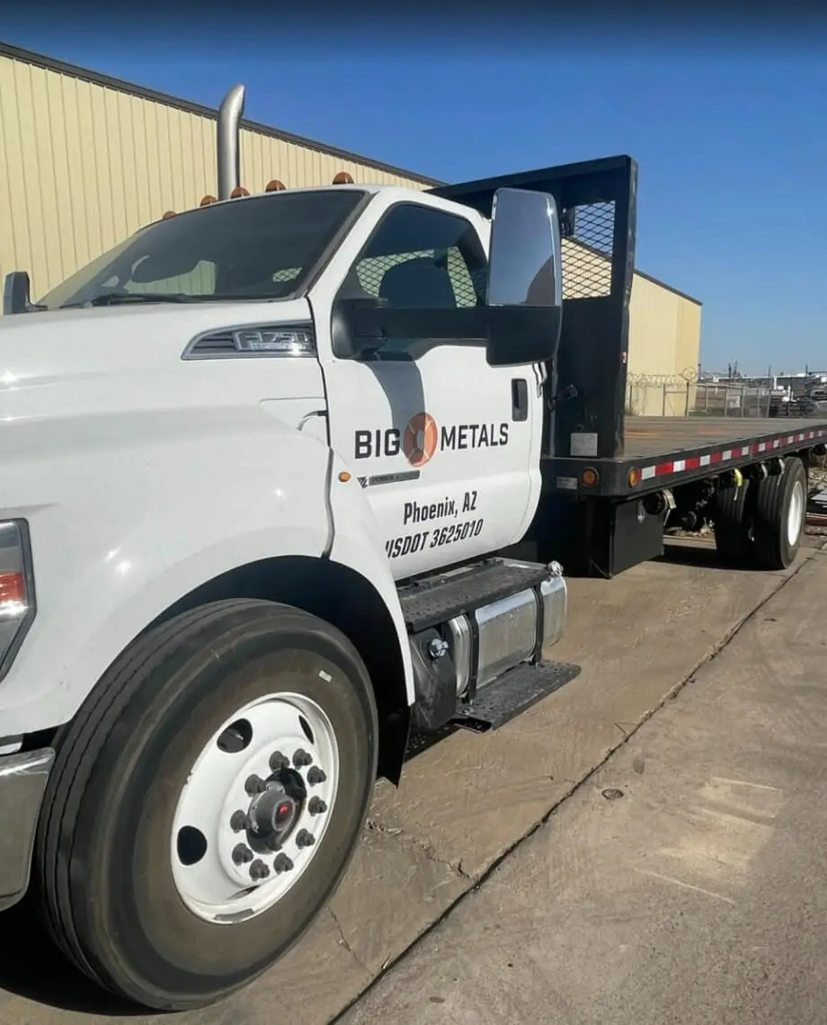 Big O Metals flatbed delivery truck parked outside its Phoenix facility