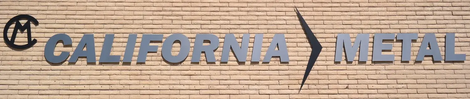 California Metal lettering and logo mounted on the brick wall of the company's building