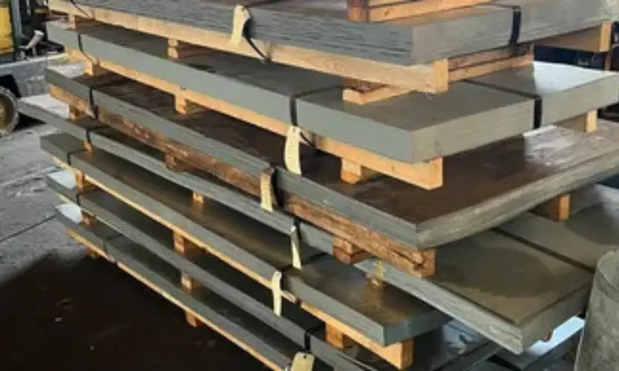 Stacks of leveled flat-rolled steel sheet on pallets at Eastern States Steel