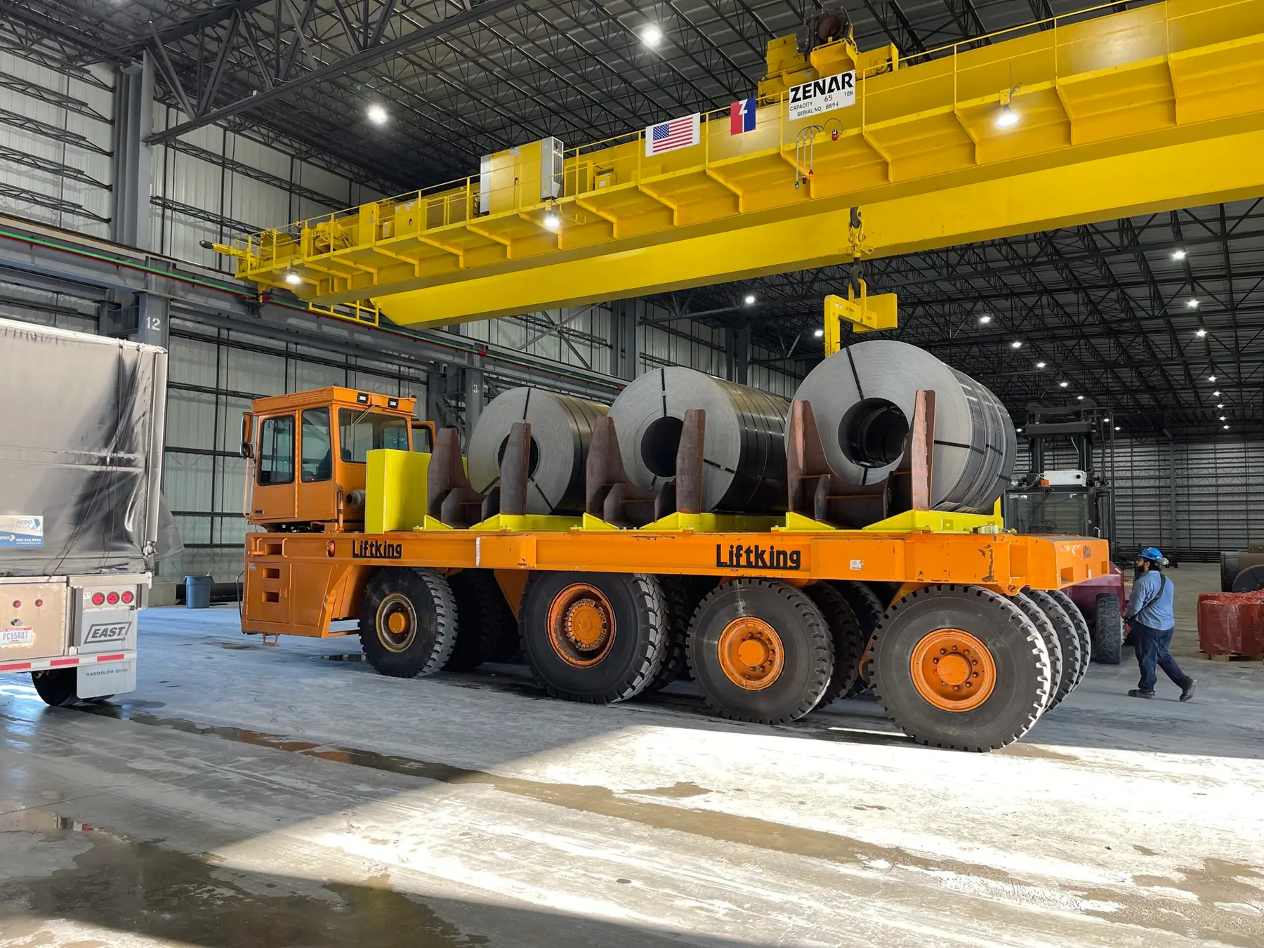 Coil carrier truck loaded with slit steel coils inside the Ferrous 85 building in Sinton, Texas