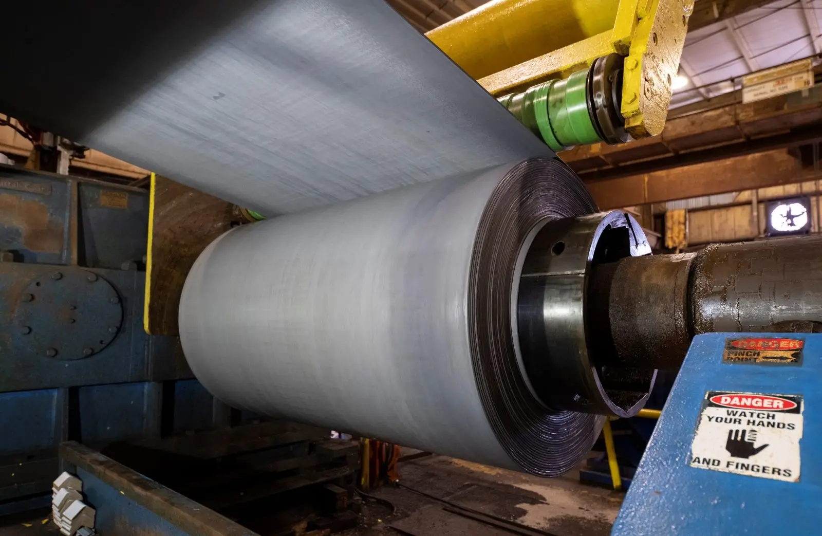 Pickled steel coil being wound on a mandrel at the pickle line