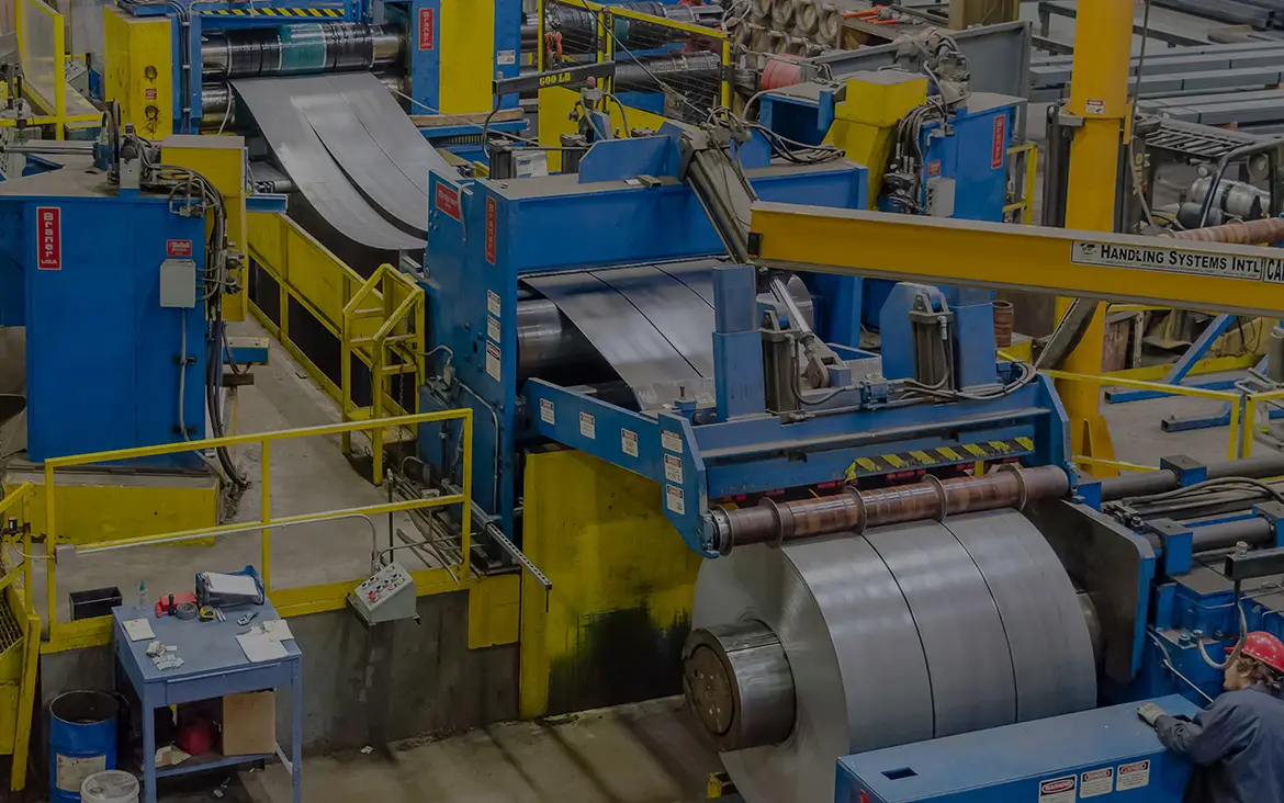 Steel coil running through Hagerty's slitting line in East Peoria, Illinois