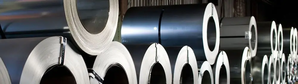 Stacked steel coils in Harbor Pipe & Steel's Riverside warehouse