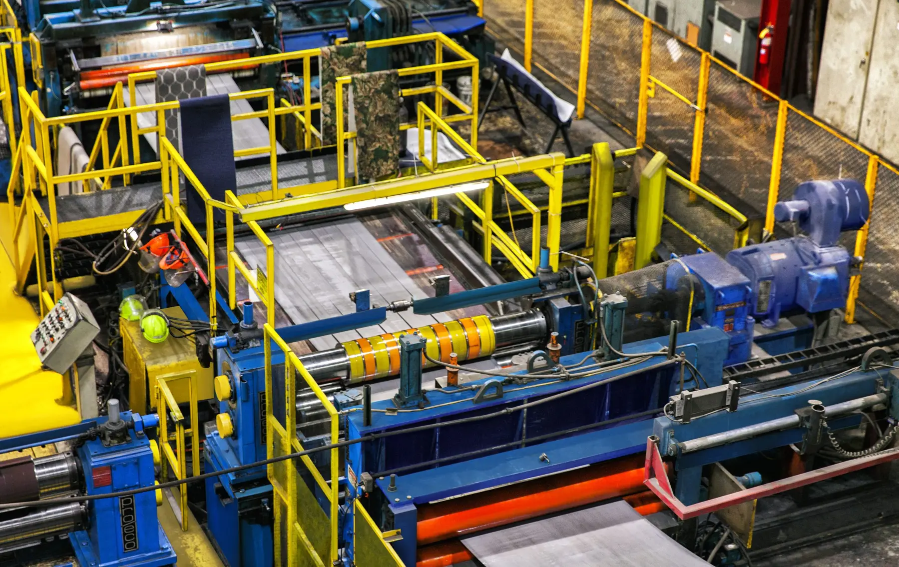 Overhead view of a Heidtman Steel slitting line with guarded walkways