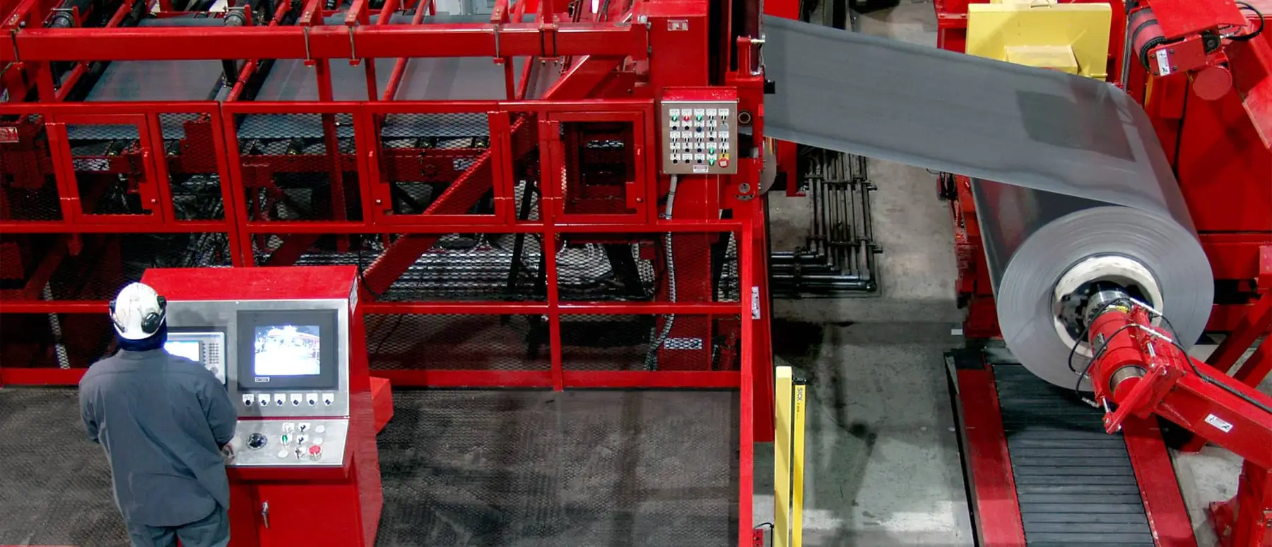 JDM Steel's SCS coil cleaning and tension leveling line with a hot-rolled coil feeding the entry end