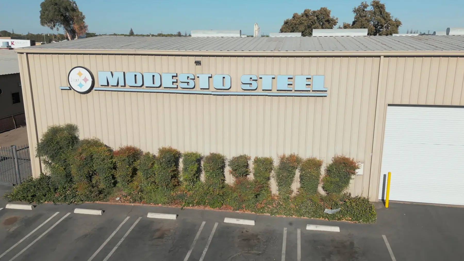 Modesto Steel's warehouse building and sign on North Emerald Avenue in Modesto