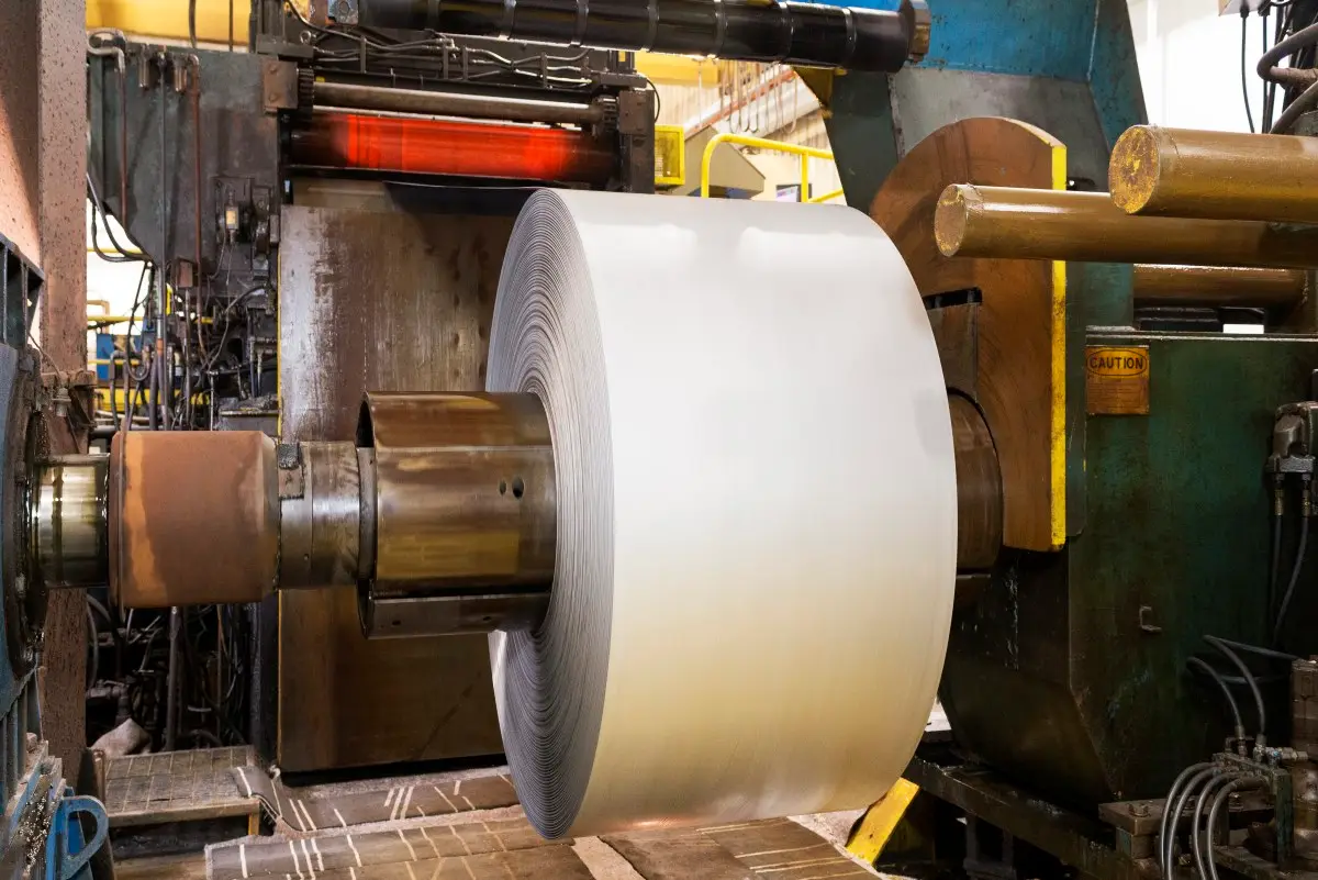 A freshly coated galvanized steel coil on the recoiler of National Galvanizing's processing line
