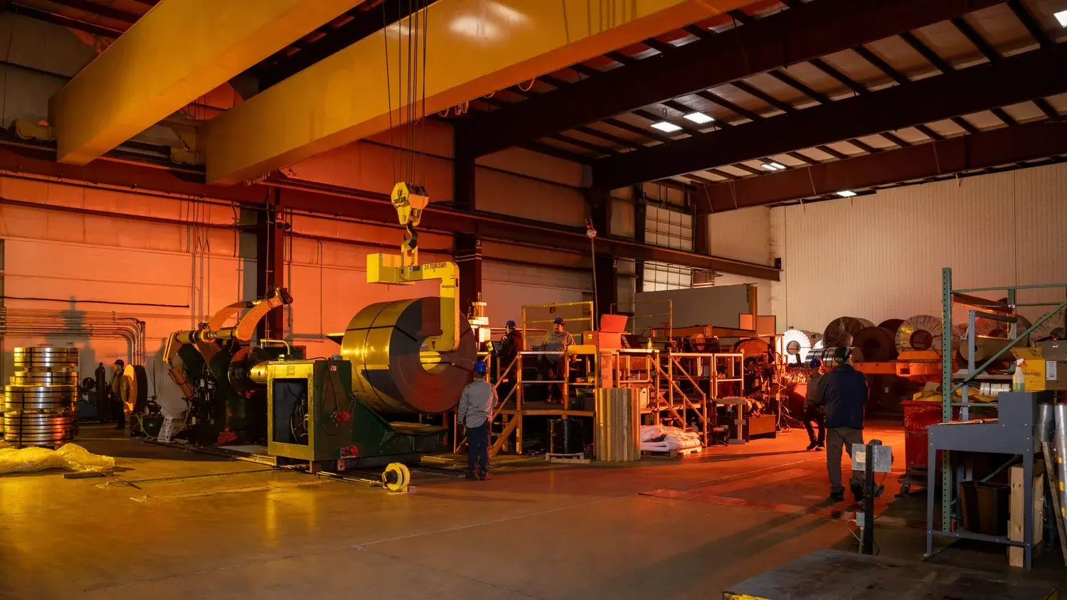 Processing bay at Northern Steel Industries with overhead cranes and coil handling equipment