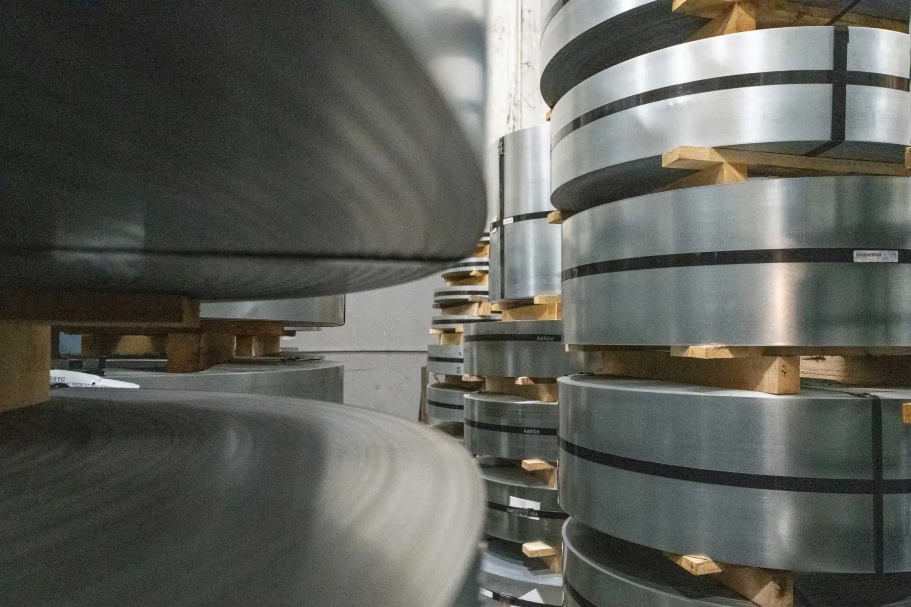 Stacked slit steel coils on skids ready for shipment at Ohio-Kentucky Steel