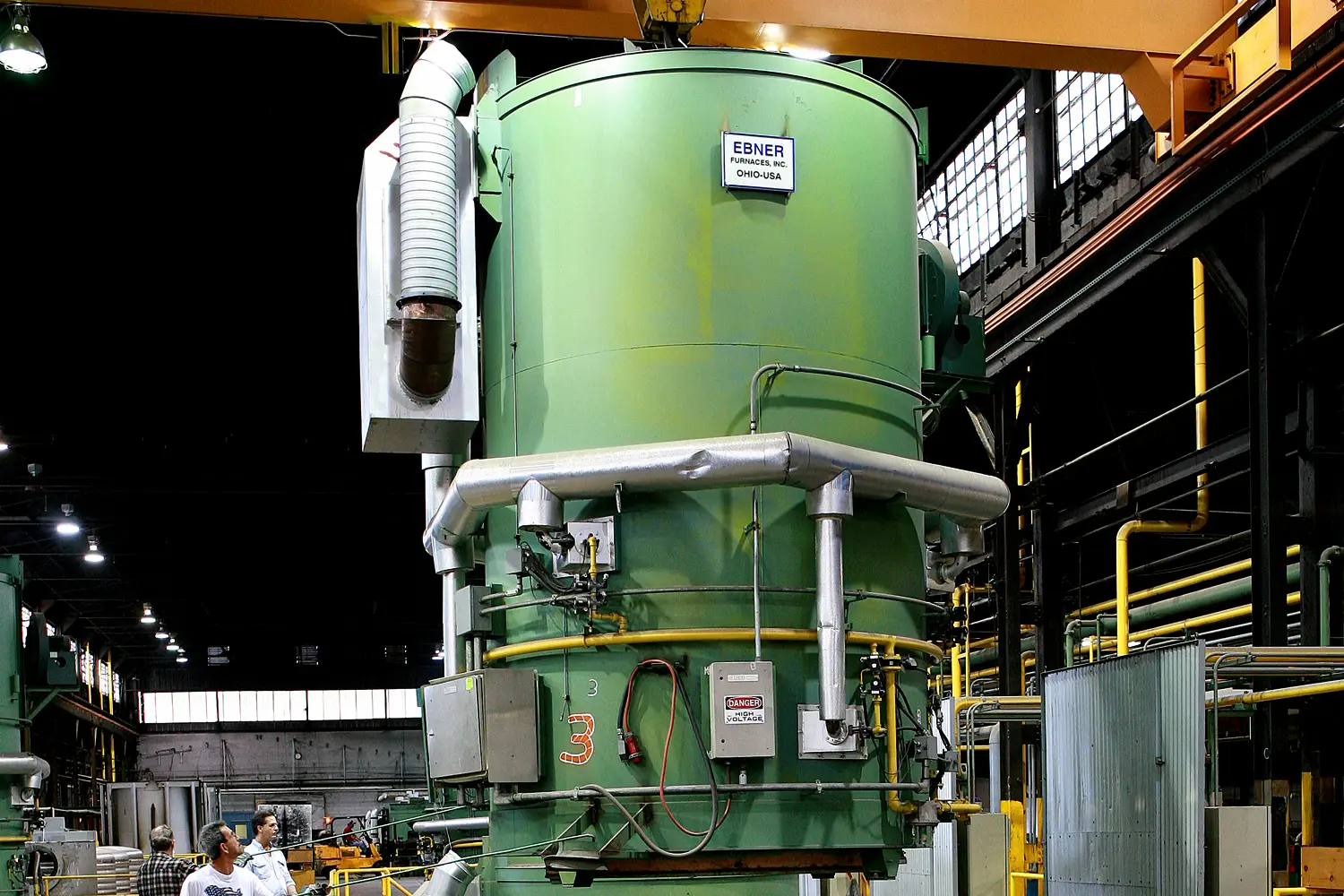 Ebner hydrogen annealing furnace standing on the plant floor with overhead crane above