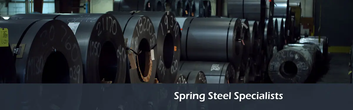 Coils of spring and martensitic steel stored in Regal Steel's Warren, Michigan warehouse