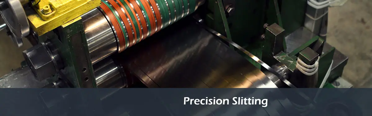 Regal Steel slitter knives cutting cold-rolled spring steel into narrow strands