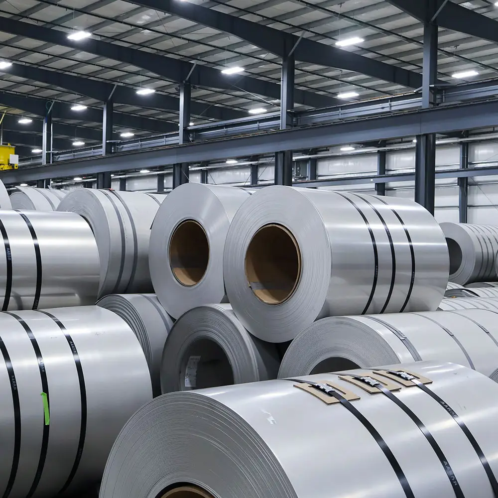 Stainless and alloy coils stored in the high-bay warehouse at Rolled Alloys' Toledo facility