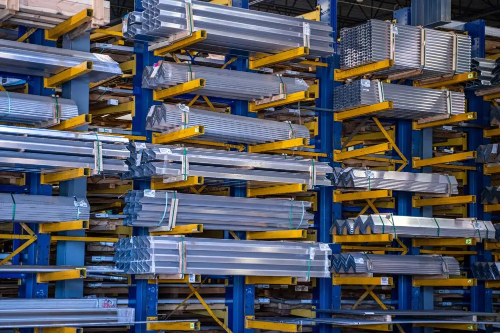 Bundles of aluminum angle and extrusions stored on cantilever racks