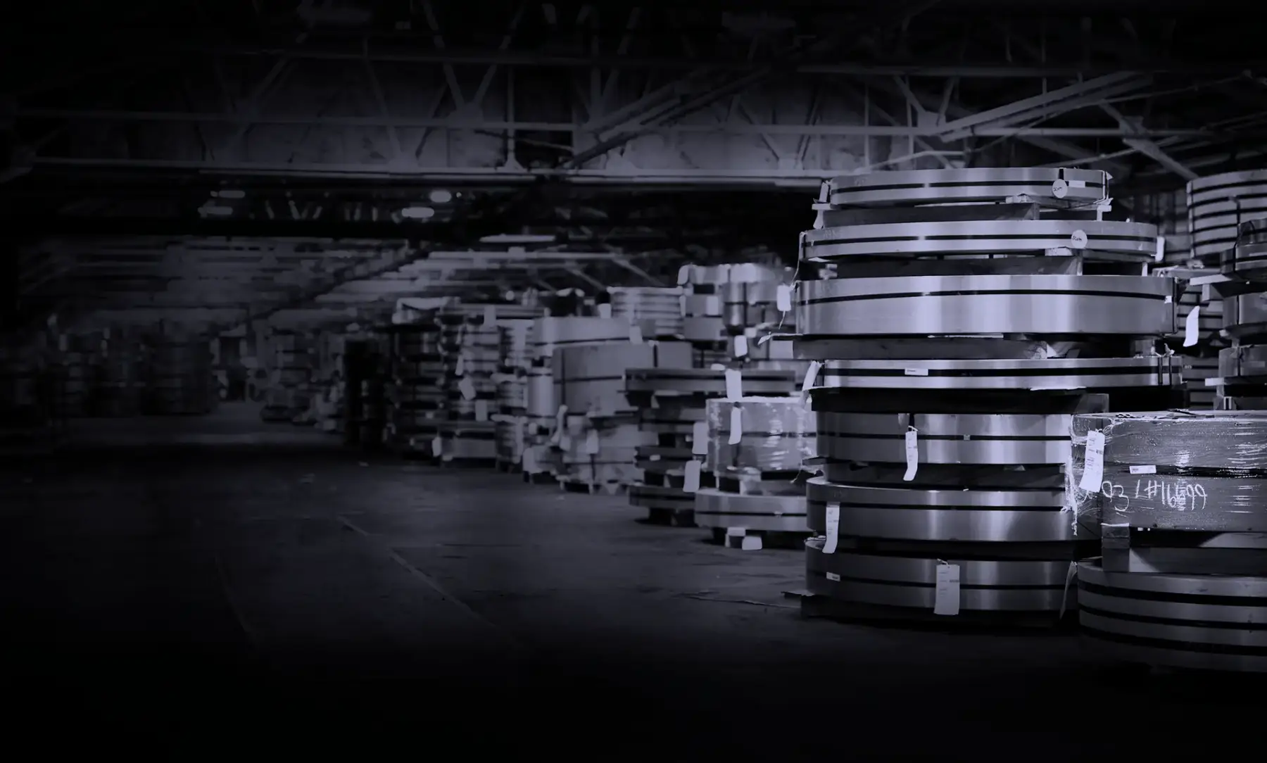 Stacks of slit low-carbon steel coils in Scott Steel's warehouse