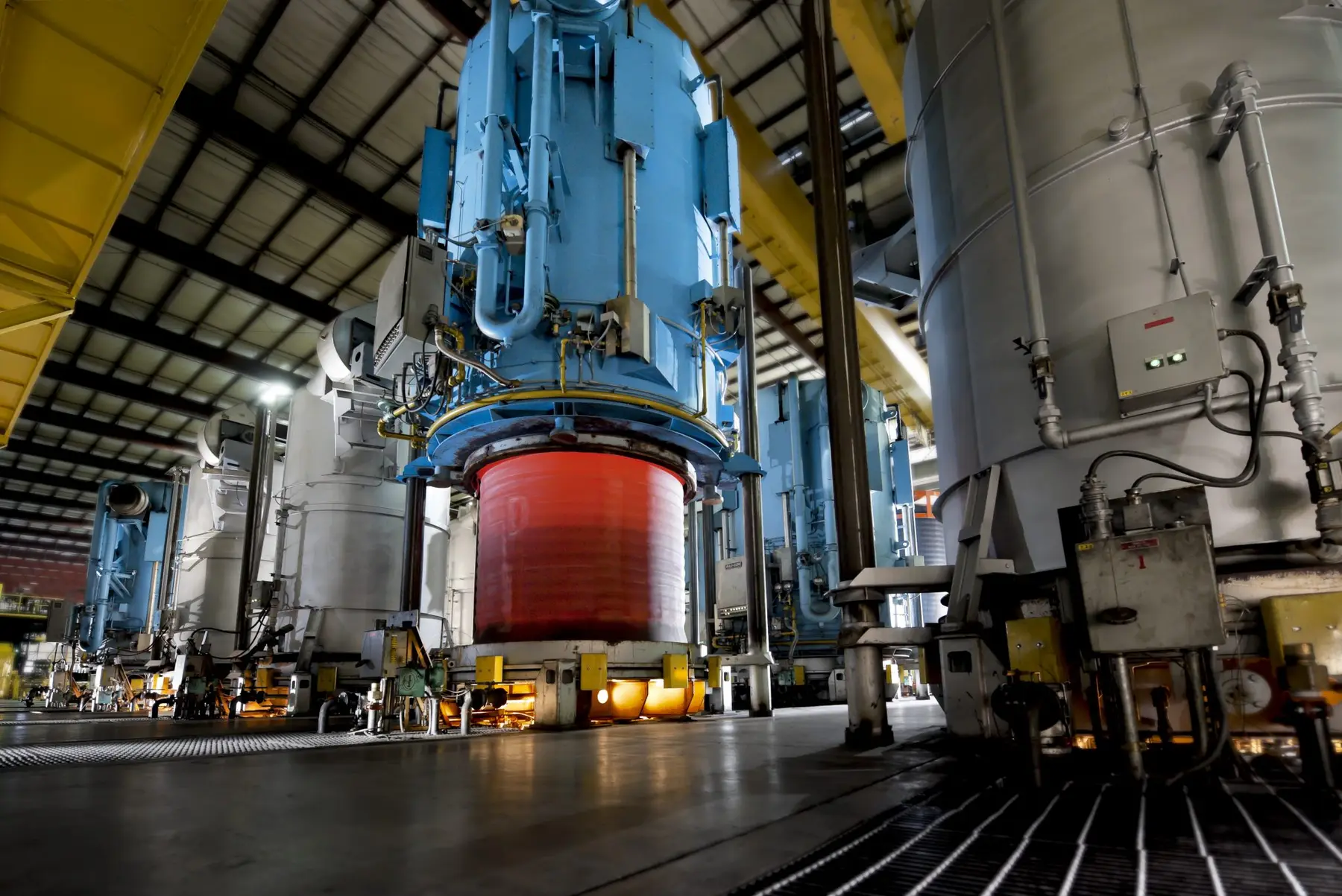 Batch annealing furnace bases and coil stacks in a steel processing plant