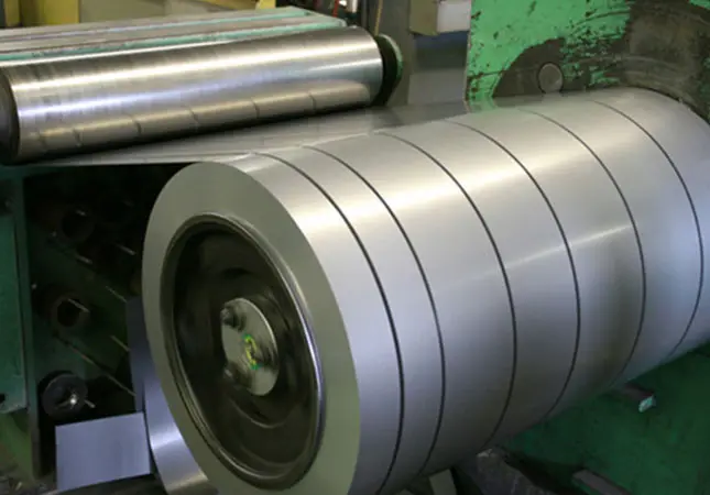 Steel strip rewinding into narrow slit coils on a slitting line