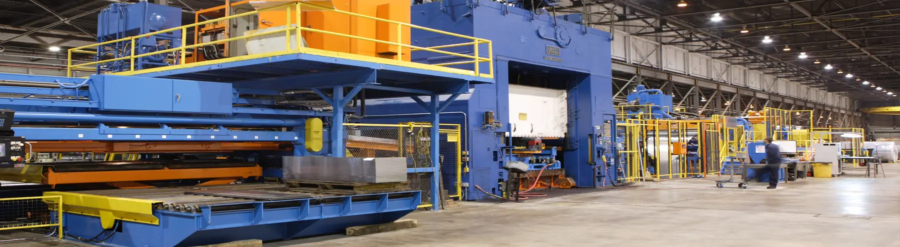 Blanking press line with blank stacking conveyor on a Diez Group plant floor