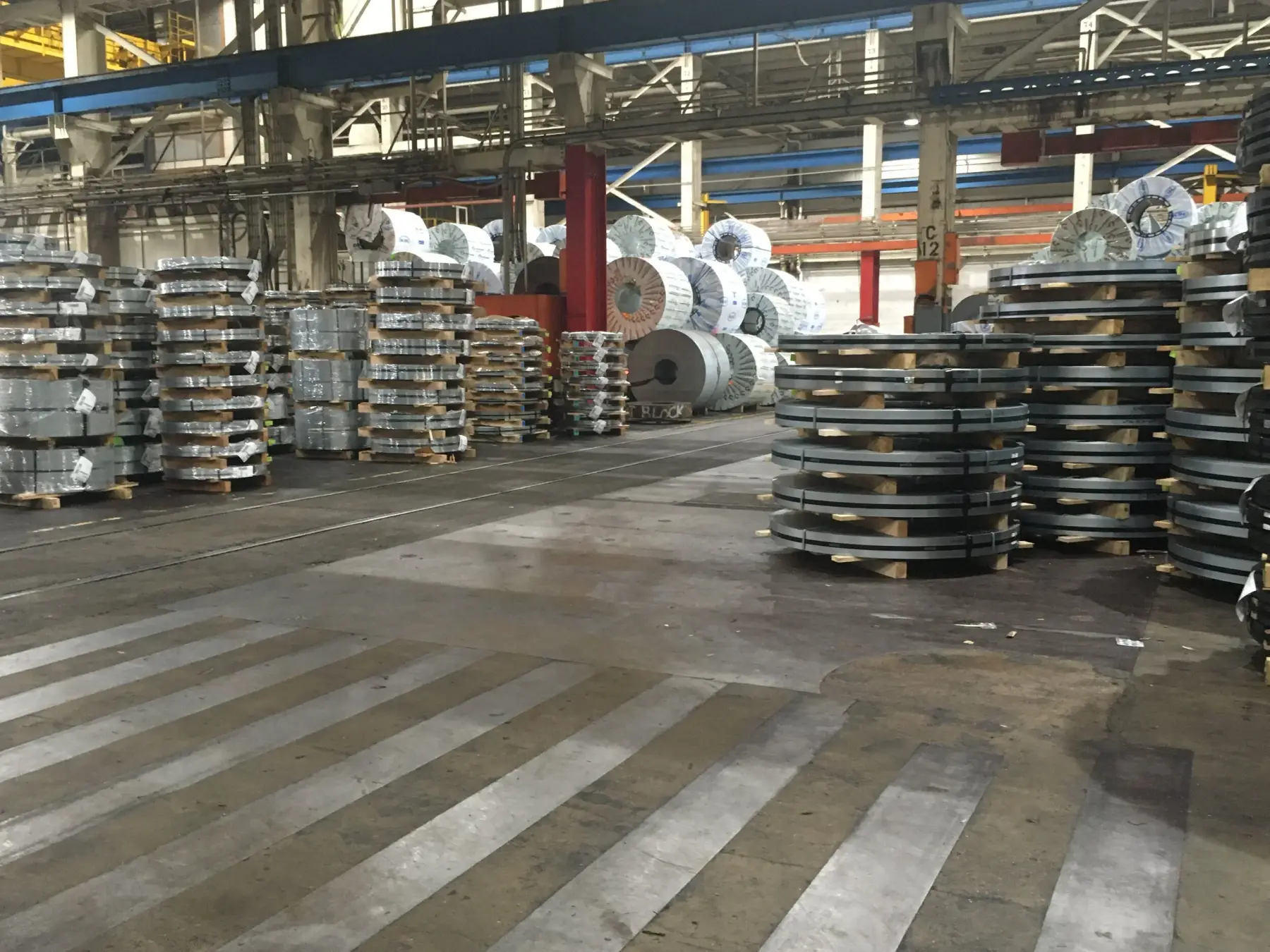 Stacks of slit steel coils on pallets in VAP Steel's East Pittsburgh warehouse