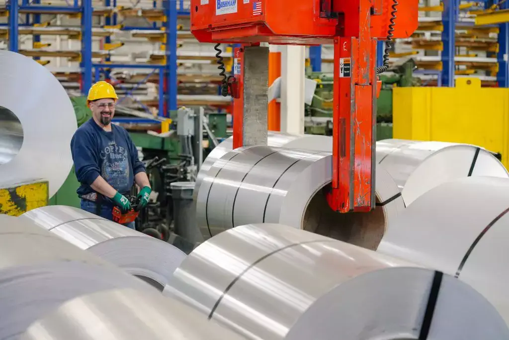 Overhead crane handling slit steel coils on the Viking Materials plant floor